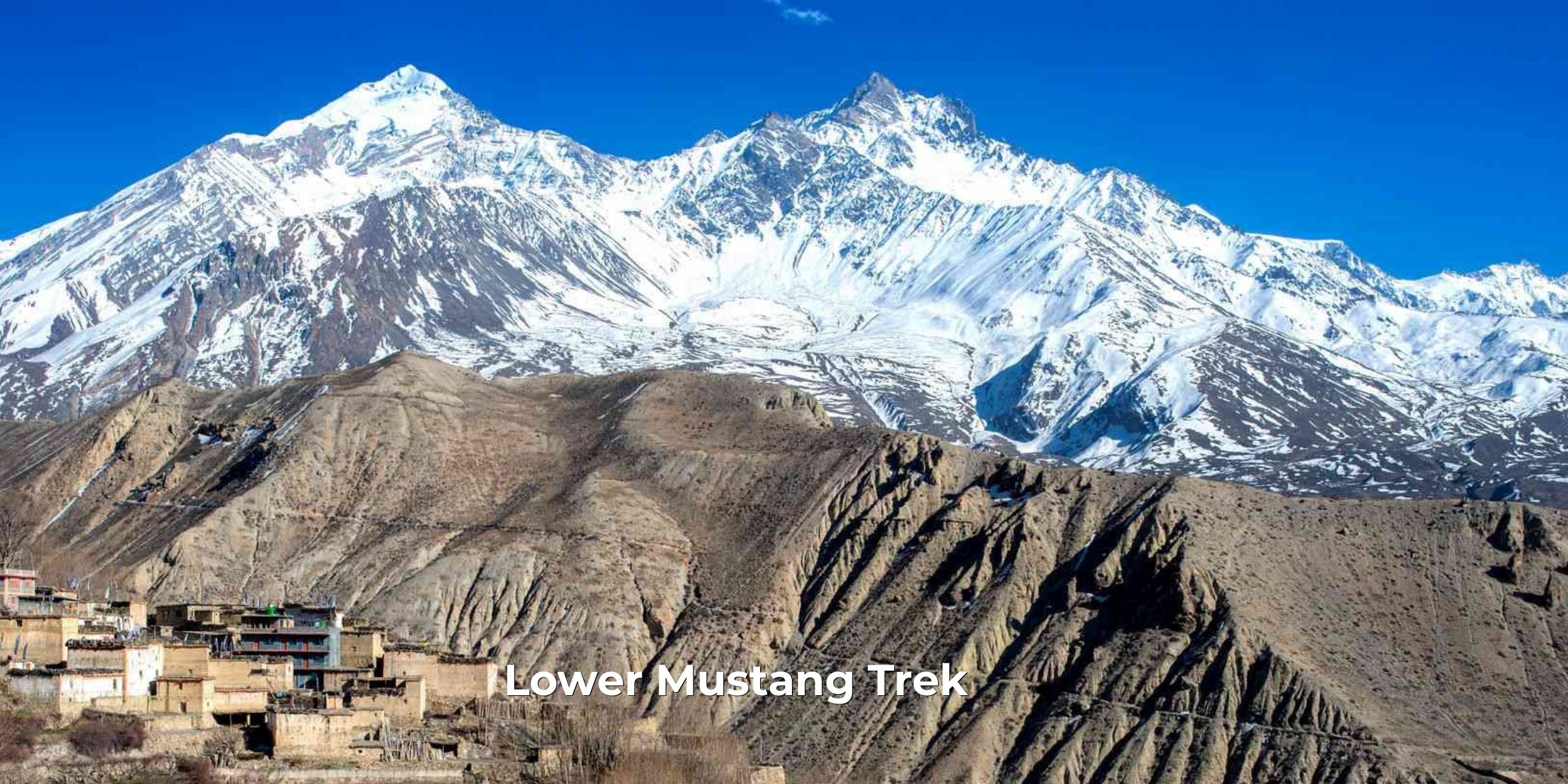 "Lower Mustang Trek with Himalayan views, traditional villages, monasteries, apple orchards, and scenic trekking trails."